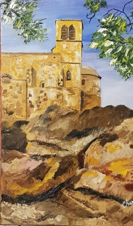 La chapelle Saint Vincent 27x35 cm - Huile Église en pierre surplombant des rochers jaunis, sous un ciel bleu et quelques feuillages.